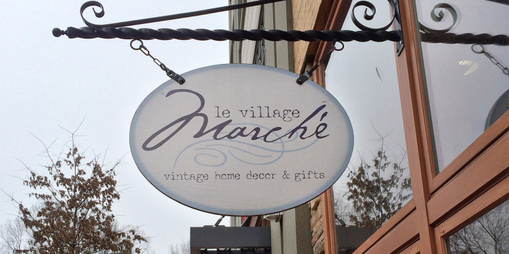 Le Village Marche outdoor hanging sign